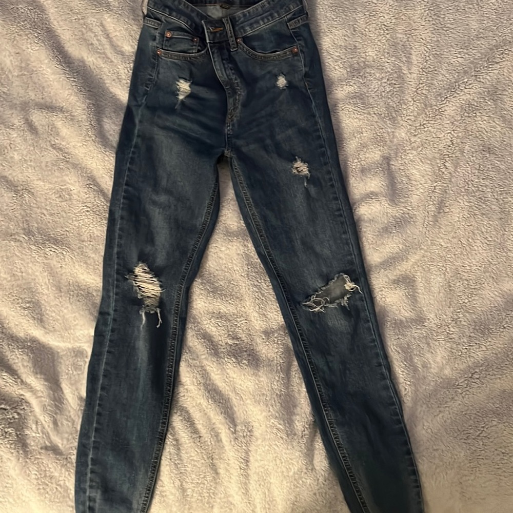 Dark blue skinny ripped jeans